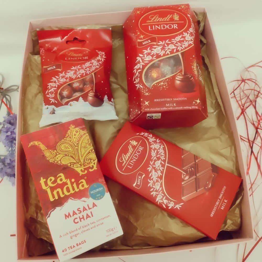 Golden chai & Lindt chocolate moments collection gift hamper